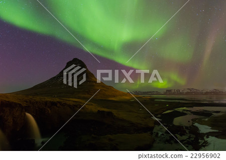 Beautiful aurora over Kirkjufell mountain Beautiful aurora over Kirkjufell mountain 22956902