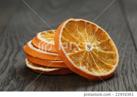 dried orange slices on old table dried orange slices on old table 22958361