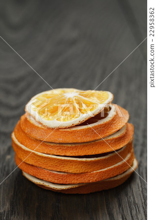 dried orange slices on old table dried orange slices on old table 22958362