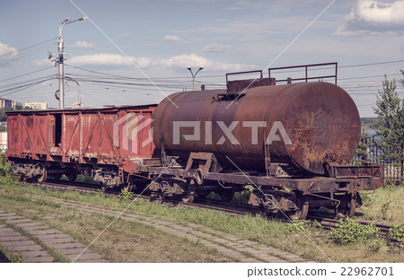 Old covered goods wagon and tank car Old covered goods wagon and tank car 22962701