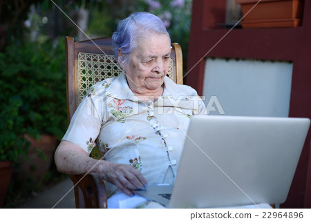 Grandma using a laptop 22964896