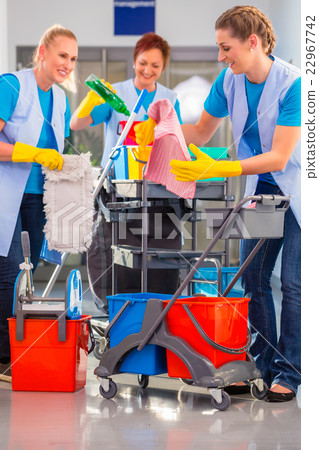 Commercial cleaners doing the job together 22967742