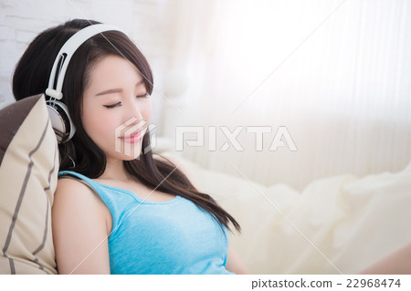 woman enjoying the music 22968474