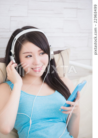 woman enjoying the music woman enjoying the music 22968499