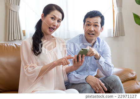 A man who is crazy for a smartphone _ surprised A man who is crazy for a smartphone _ surprised 22971127