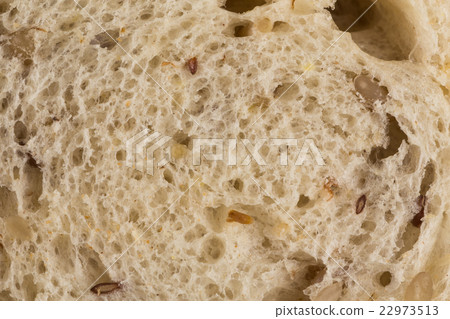 Wheat bread with sunflower seeds close up photo Wheat bread with sunflower seeds close up photo 22973513