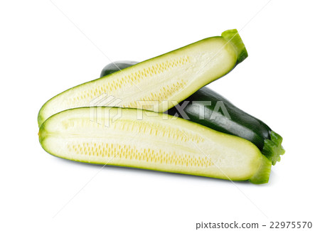 whole and half cut fresh Zucchini on white whole and half cut fresh Zucchini on white 22975570