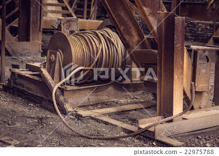 Old metal cable in blast furnace workshop 22975788