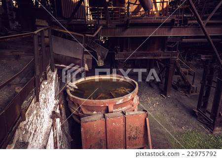 Old slag disposal pots in blast furnace workshop Old slag disposal pots in blast furnace workshop 22975792