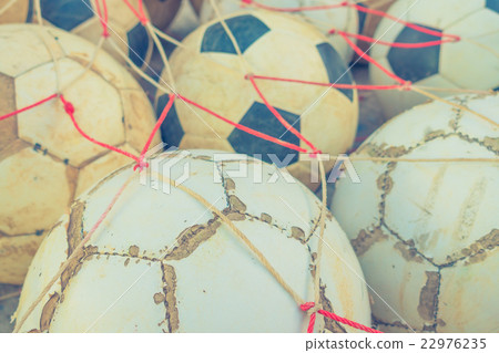 Group of Old football . ( Filtered image processed vintage effect. ) Group of Old football . ( Filtered image processed vintage effect. ) 22976235