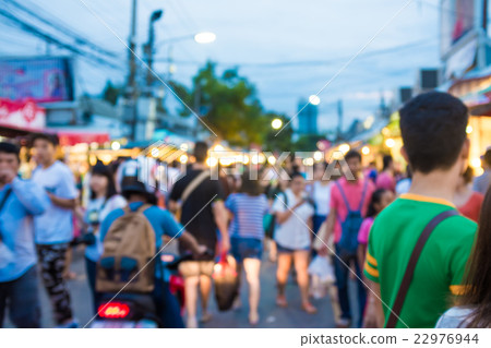 Blurred image of people at Chatuchak market. 22976944