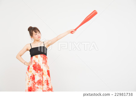 A woman with a bat 22981738
