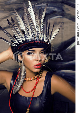 young pretty woman with make up like red indian young pretty woman with make up like red indian 22983087