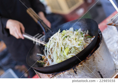Cheff cooking on outdoor street food festival. 22985038