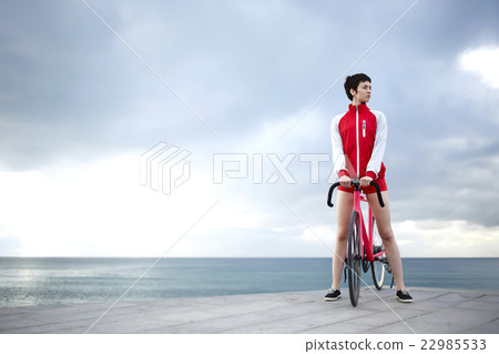 Young hipster girl is resting after riding Young hipster girl is resting after riding 22985533