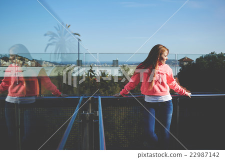 Attractive female dressed in trendy basic clothes Attractive female dressed in trendy basic clothes 22987142