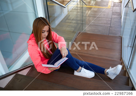 Teenager preparing for classes or exams at school 22987166