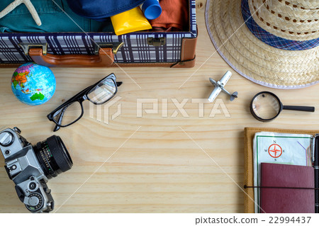 Outfit of traveler on wooden background 22994437