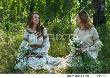 Beautiful women relaxing on nature Beautiful women relaxing on nature 22995916