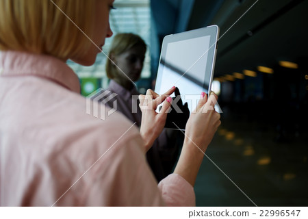 Female student using digital tablet,  22996547