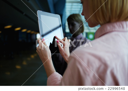 Young person using digital tablet 22996548
