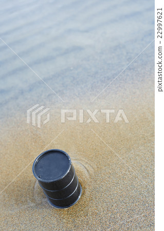 Oil barrel abandoned at the sea coast Oil barrel abandoned at the sea coast 22997621