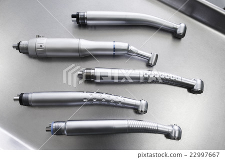 Set of dental handpieces without burs flat lay Set of dental handpieces without burs flat lay 22997667