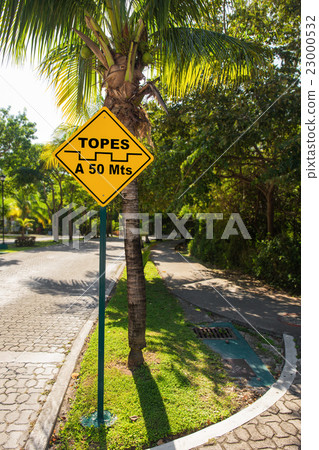 Topes speed bump sign at caribbean street, Mexico Topes speed bump sign at caribbean street, Mexico 23000532