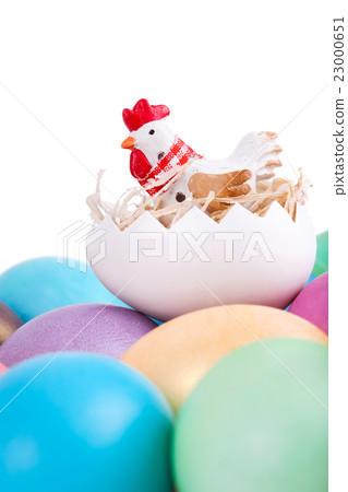 Chicken toy on easter eggs Chicken toy on easter eggs 23000651