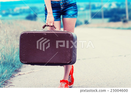 Beautiful girl stops the car 23004600