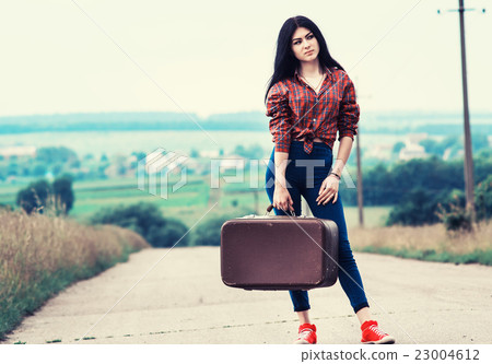 Beautiful girl stops the car 23004612