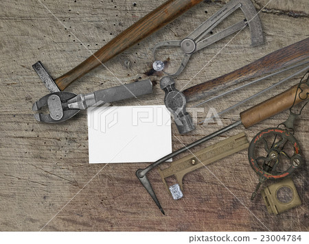 vintage jeweler tools over wooden bench vintage jeweler tools over wooden bench 23004784