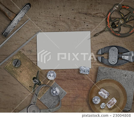 vintage jeweler tools over wooden bench 23004808