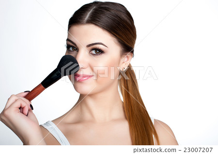 Emotional portrait of a young beautiful girl  23007207