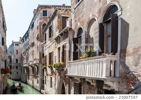 Vintage house with a balcony decorated 23007597