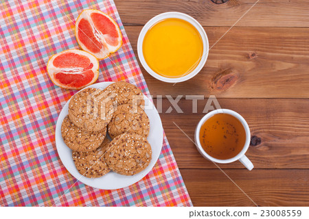 Cup of tea and citrus honey cookies . Cup of tea and citrus honey cookies . 23008559