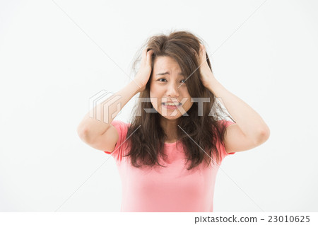 A woman holding a head 23010625