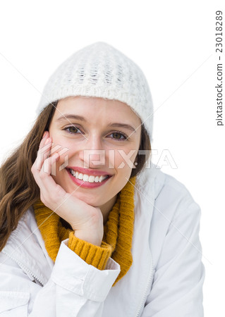 Pretty brunette posing with head on hand 23018289