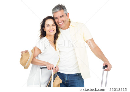 Couple with bags embracing each other Couple with bags embracing each other 23018315