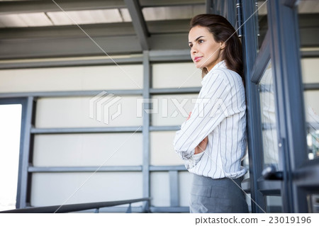 Young businesswoman in office 23019196