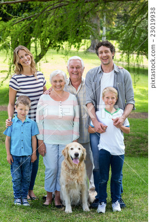 Family with dog in the park Family with dog in the park 23019938