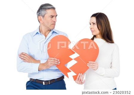Couple holding broken heart Couple holding broken heart 23020352