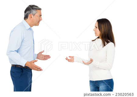 Couple arguing while standing Couple arguing while standing 23020563