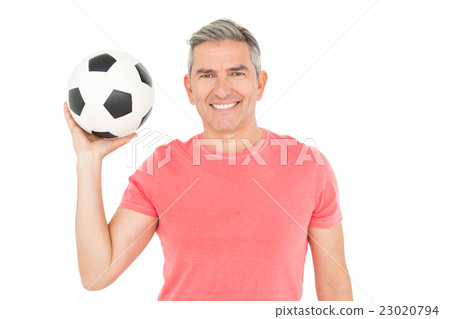 Happy football fan holding ball 23020794