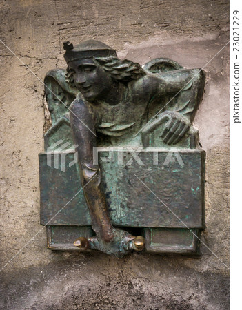 Angel with a shield as decorative element Angel with a shield as decorative element 23021229