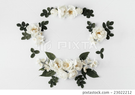 Summer floral frame with white wild roses Summer floral frame with white wild roses 23022212