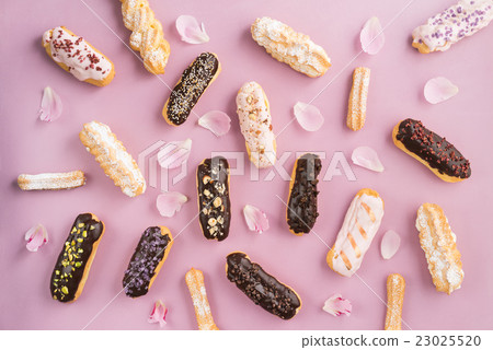 Eclairs with ganache and toppings 23025520
