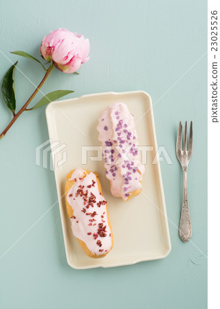Eclairs with icing Eclairs with icing 23025526