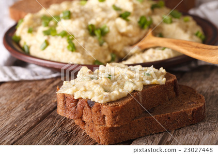 Sandwiches with forshmak macro on the table 23027448