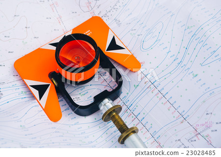 orange odolite prism lies background geodetic maps 23028485